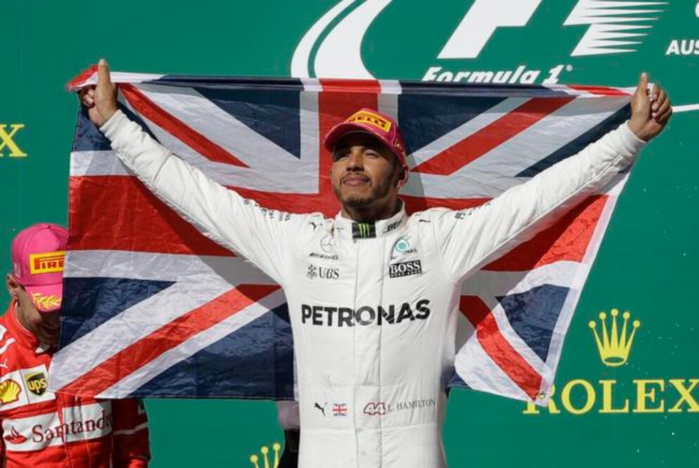 Aunque el británico ganó el GP de EU, Vettel aún tiene chance. (ERIC GAY. AP)