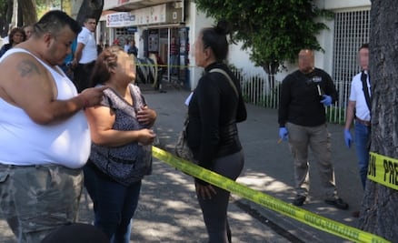 "Era mi bebé", llora madre por su hijo abatido en banco por policía de investigación