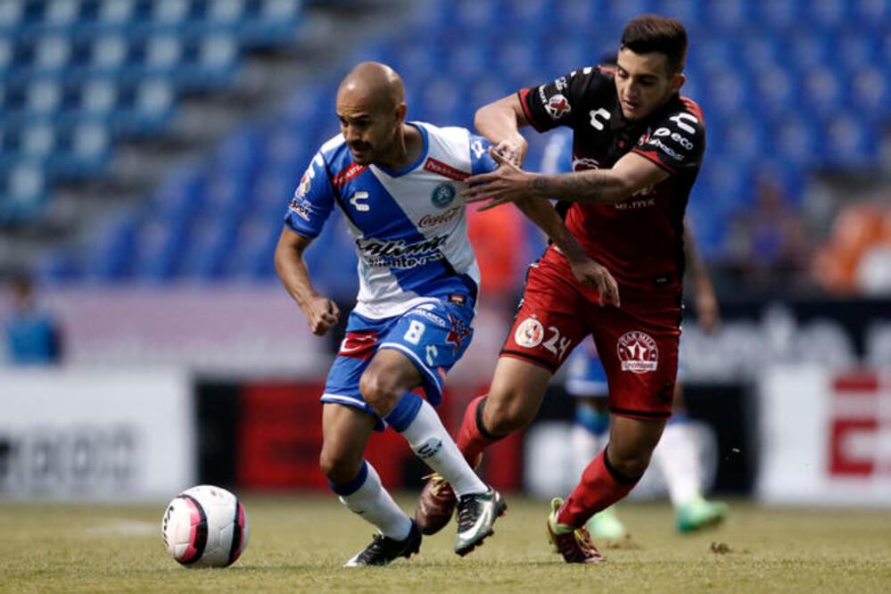 Los poblanos sumaron un punto que poco les sirve en la porcentual (HUGO ORTUÑO. EFE)