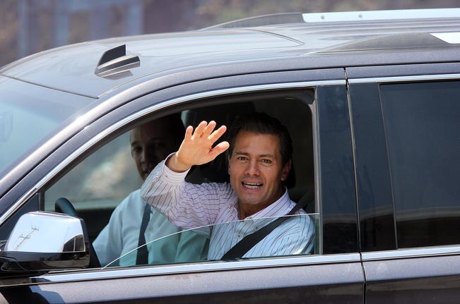 Visita oficial. Agentes estatales montaron un operativo de seguridad en las instalaciones de General Electric, a propósito de la visita del Ejecutivo (LUIS SÁNCHEZ. EL UNIVERSAL)