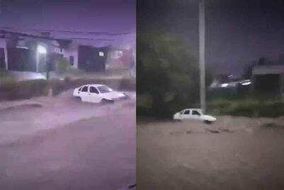 Vehículo es arrastrado por corriente de agua tras fuertes lluvias en Querétaro