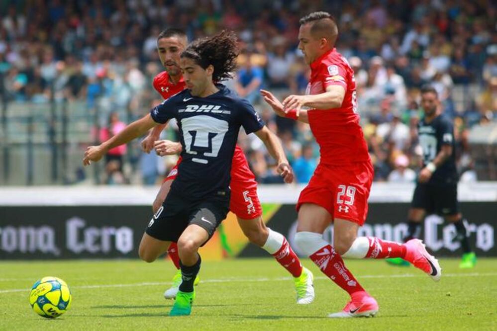 Britos fue secado por la zaga toluqueña, que incomodó en todo momento al delantero felino para evitar hacer daño. (MAURICIO SALAS. JAM MEDIA)