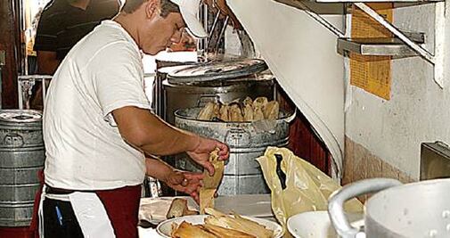 ¡A pagar los tamales!