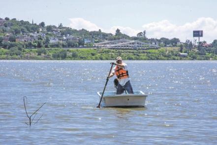 Pescadores "hacen su agosto" en plena temporada de lluvias, en Querétaro