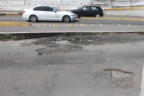 Afectan lluvias la carpeta asfáltica