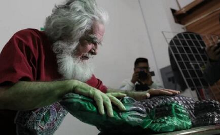 Con un reptil, Brujo Mayor pide por la salud de AMLO