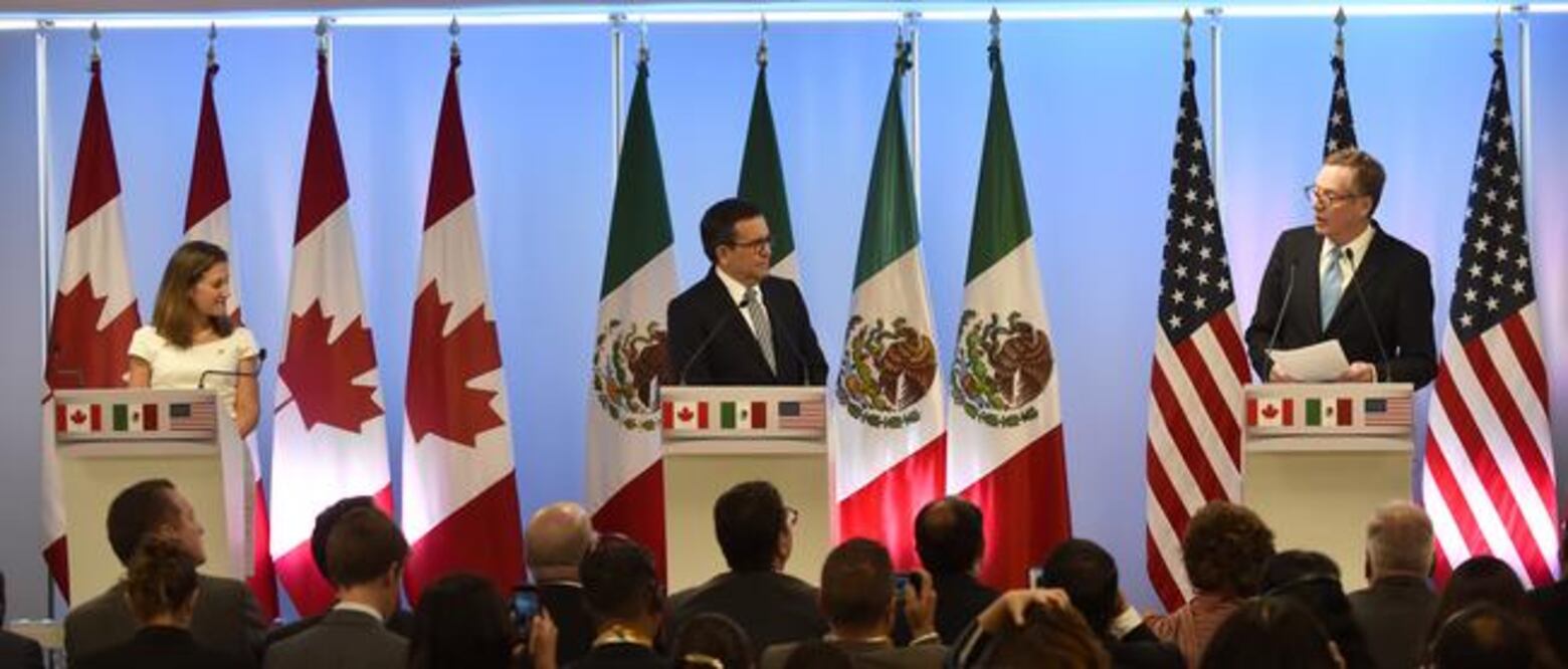 Chrystia Freeland, ministra de Relaciones Exteriores de Canadá; Ildefonso Guajardo, secretario de Economía de México, y Robert Lighthizer, representante comercial de Estados Unidos, ayer en conferencia. FOTO: PEDRO PARDO. AFP