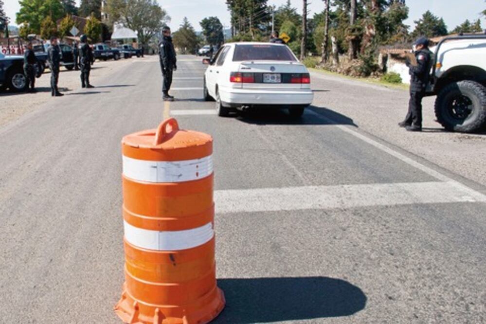 Investigan homicidio de familia de Amealco