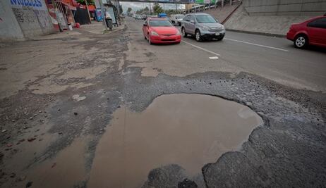 Exhortan a reportar baches