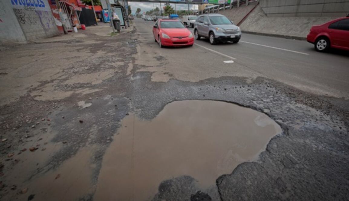 Exhortan a reportar baches
