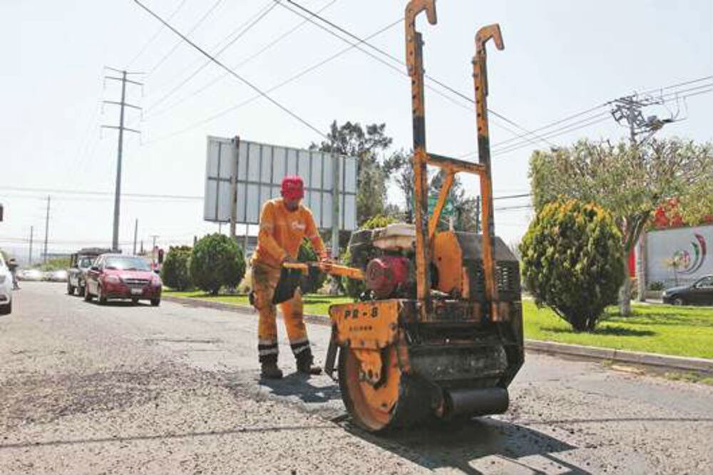 Reportan avance de 70% en bacheo