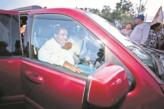 Liberan a líder de comerciantes