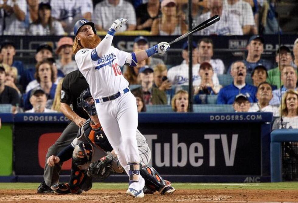 Justin Turner conectó cuadrangular de dos carreras y dar el triunfo (FOTO: KEVORK DJANSEZIAN/ AFP)