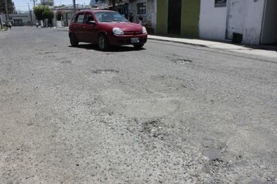 Aumentaron baches con lluvias