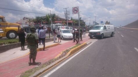 Matan a dos en un lote de autos