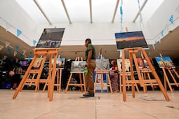 Mercados de la capital reciben muestra itinerante de fotografía