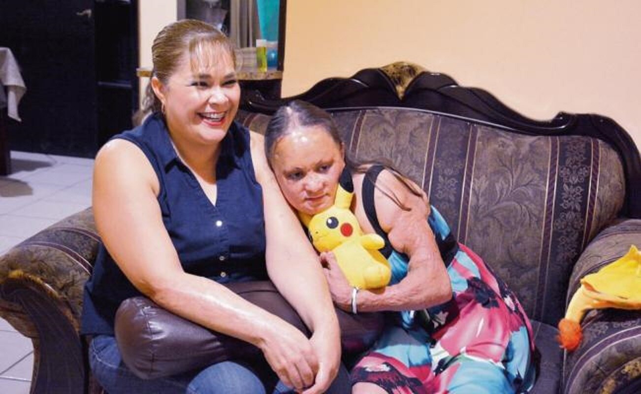 La doble batalla de Olga: como madre y ex maestra