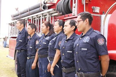 Bomberos firman convenio