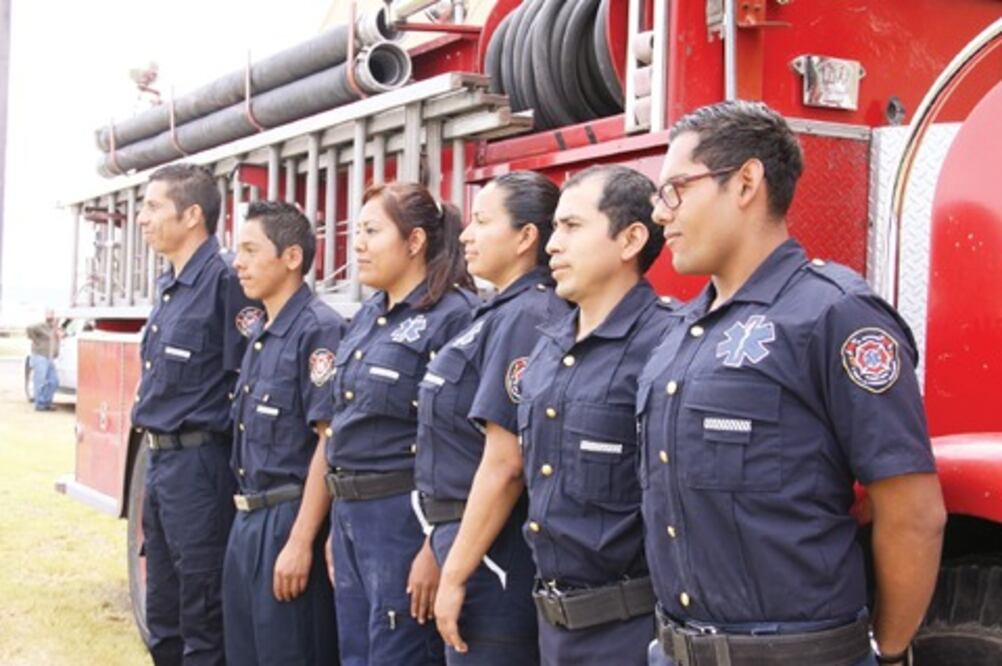 Bomberos firman convenio