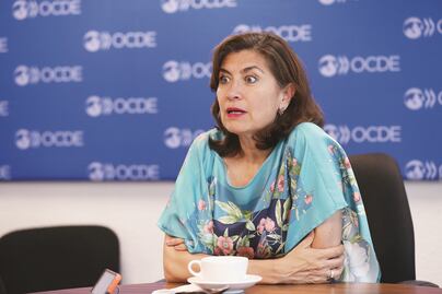 Guerra comercial bajará 1.5 a PIB global: OCDE