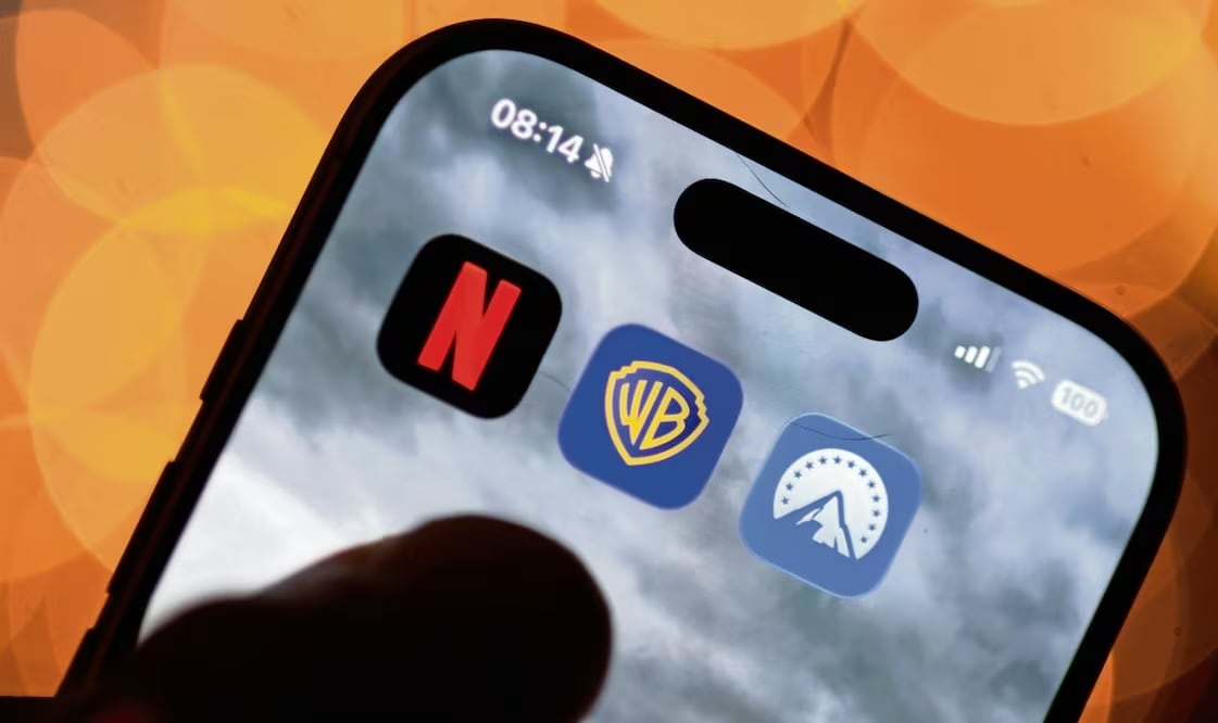 La unión entre los gigantes del entretenimiento fusionará los servicios. Foto: de HANNIBAL HANSCHKE. EFE