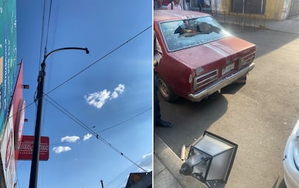 Cae farola y daña un auto estacionado en la vía pública en Querétaro