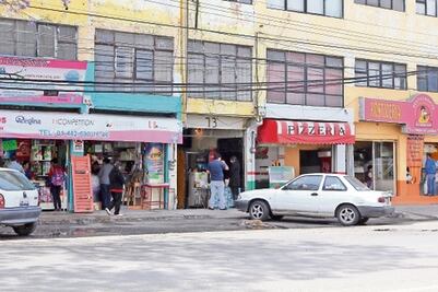 Descartan impuestos para comerciantes