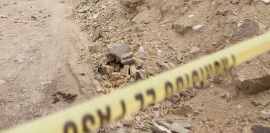 Hallan restos humanos en Querétaro; estaban en una fosa 