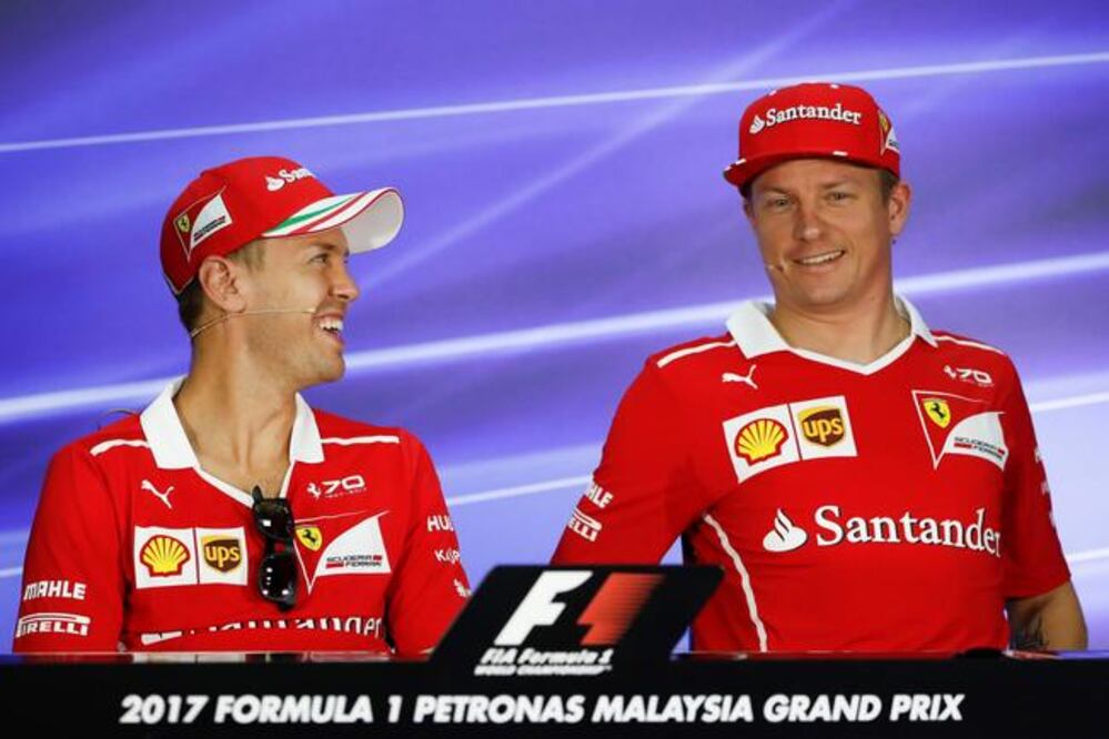 El piloto finlandés (der.) triunfó en el circuito de Sepang en 2003 y 2008 (FAZRY ISMAIL. EFE)