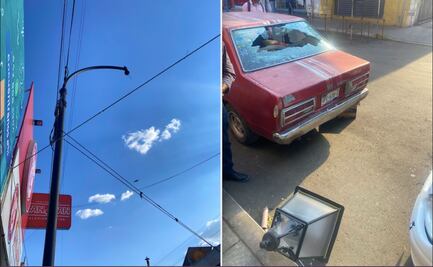 Video. Cae farola y daña un auto en la vía pública, en Querétaro