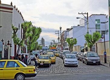 Buscan contribuciones por autos foráneos