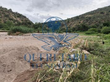 Hallan posibles restos humanos en el cauce de un río en Tolimán