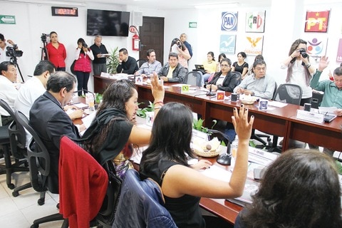 Molestia por la leyenda “PRI-PVEM” en cuadernillos