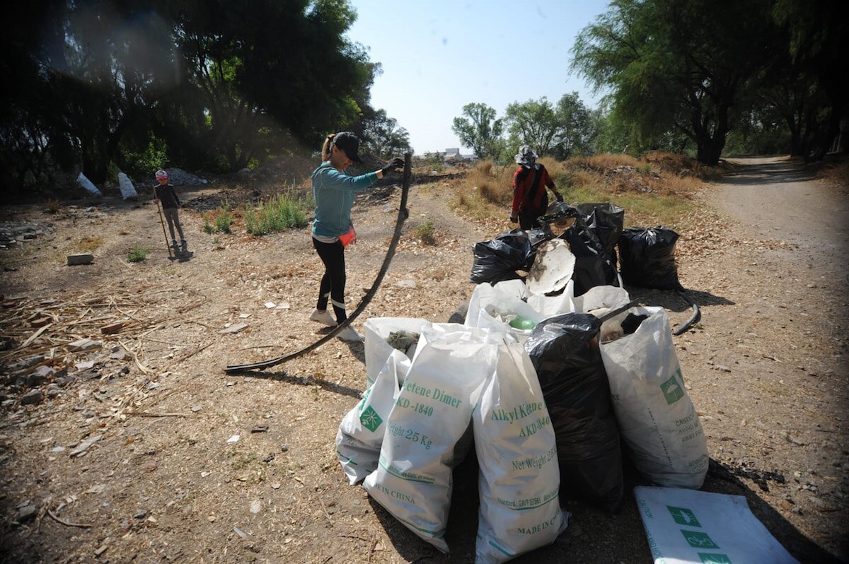 Retiran 70 kilos de basura en cauce del Río San Juan