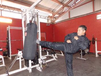 Atleta panamericano, entrenador de policías